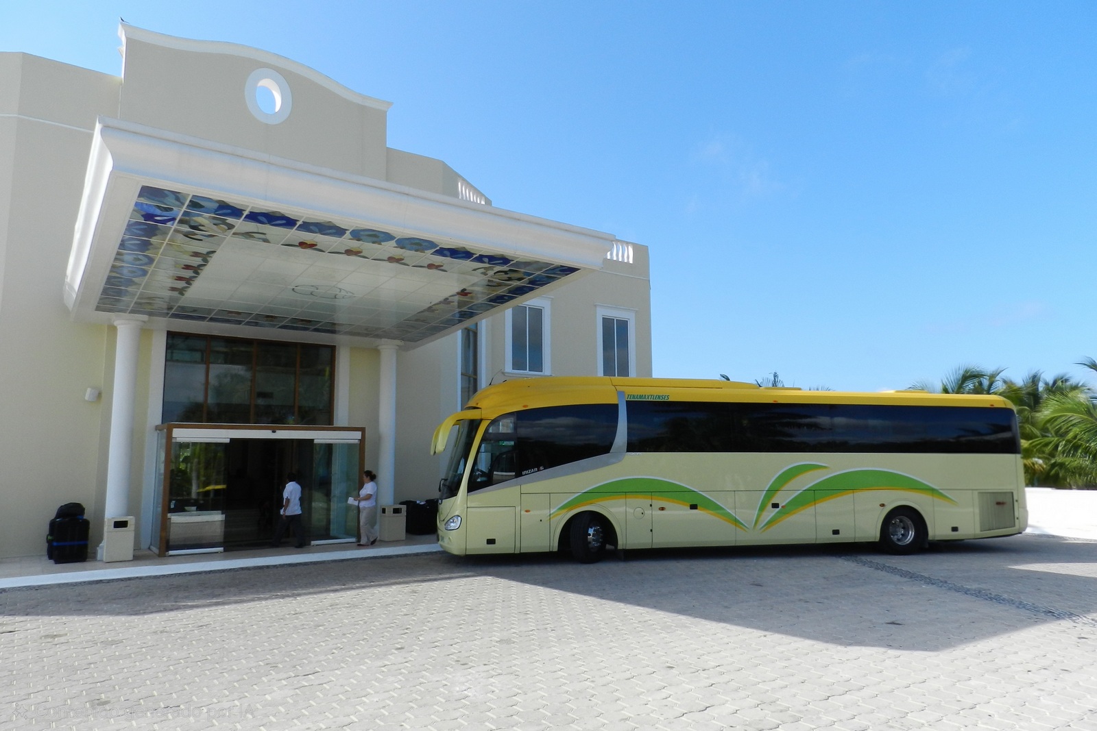 Luxury motor coach arriving at a Cancun resort